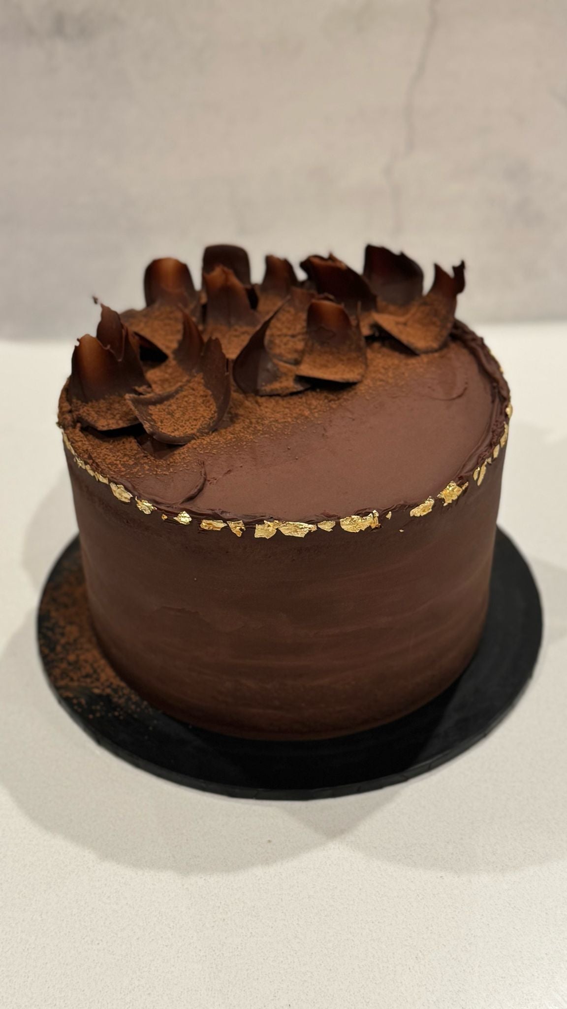 Black Forest chocolate cake with cherries and chocolate shavings, made in Christchurch